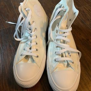 High top white leather converse. Men’s size 11/ Women’s Size 13. Brand new.
